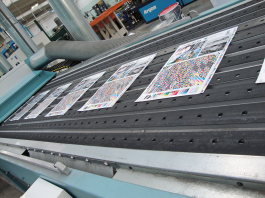 Che cosa succede quando verniciamo una stampa policroma?